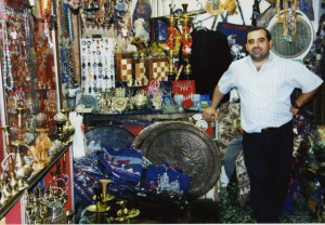 A shop keeper in his small Souq store